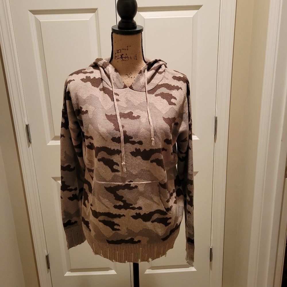 NWT Woman's stylish distressed camo sweatshirt with hood and front pocket